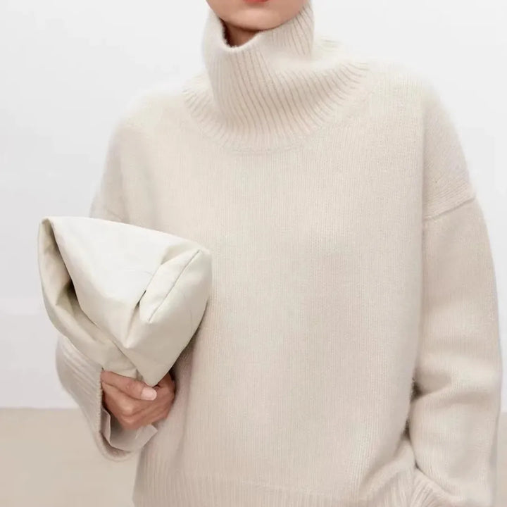 Women's plain knitted turtleneck sweater with long sleeves