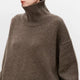 Women's plain knitted turtleneck sweater with long sleeves
