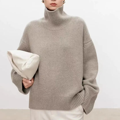 Women's plain knitted turtleneck sweater with long sleeves