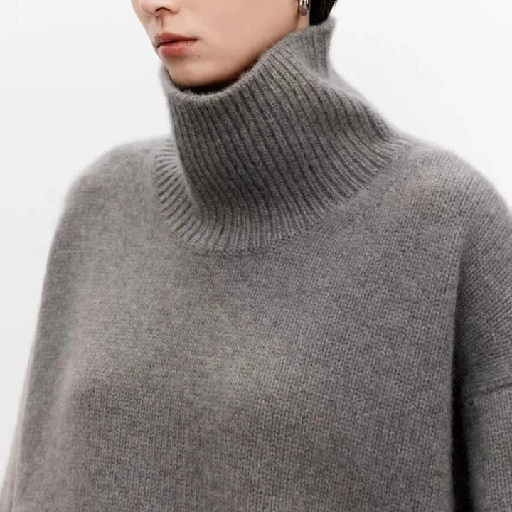 Women's plain knitted turtleneck sweater with long sleeves