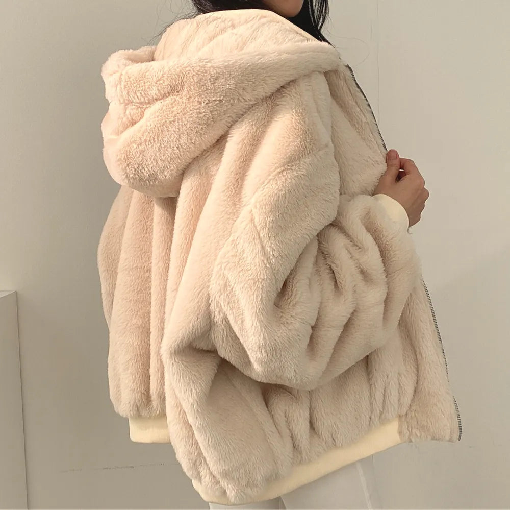 Women's lined bomber-style winter jacket with plush collar and zip front