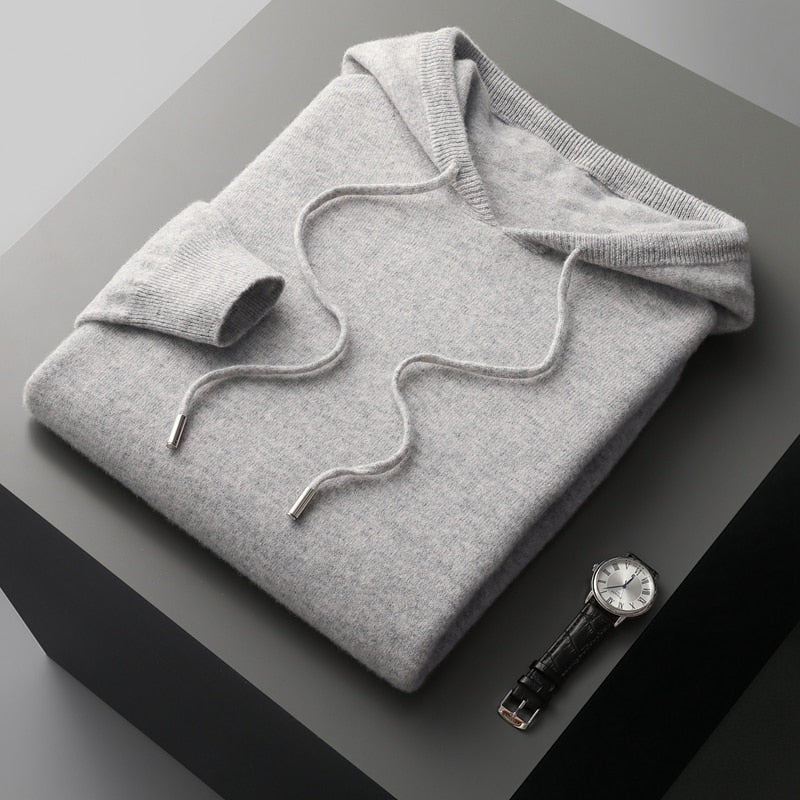 Unisex knit hoodie with drawstring hood and ribbed cuffs