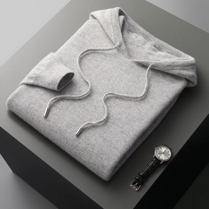 Unisex knit hoodie with drawstring hood and ribbed cuffs
