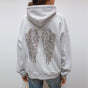 Women's gray hoodie with drawstring hood and silver sequin wings on the back