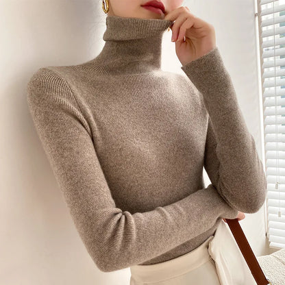 Women's ribbed turtleneck sweater with long sleeves and a slim fit