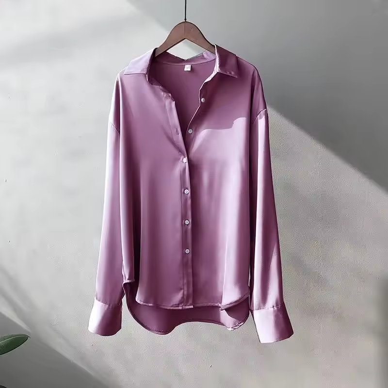 Women's long-sleeve button-front shirt blouse with pointed collar and curved hem