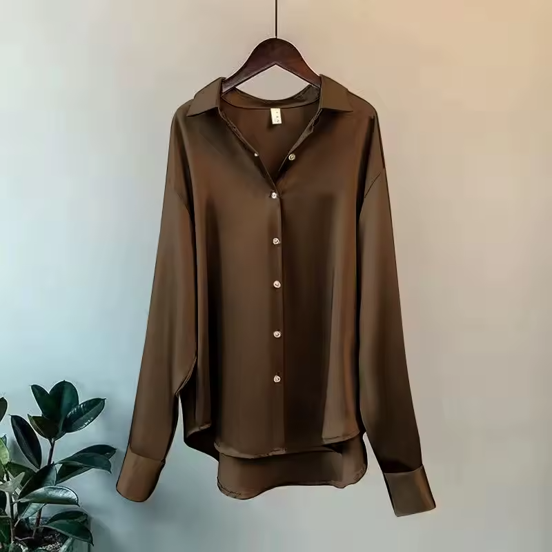 Women's long-sleeve button-front shirt blouse with pointed collar and curved hem