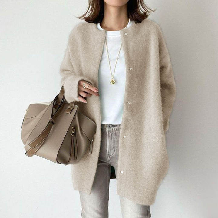 Women's long textured button front cardigan with patch pockets