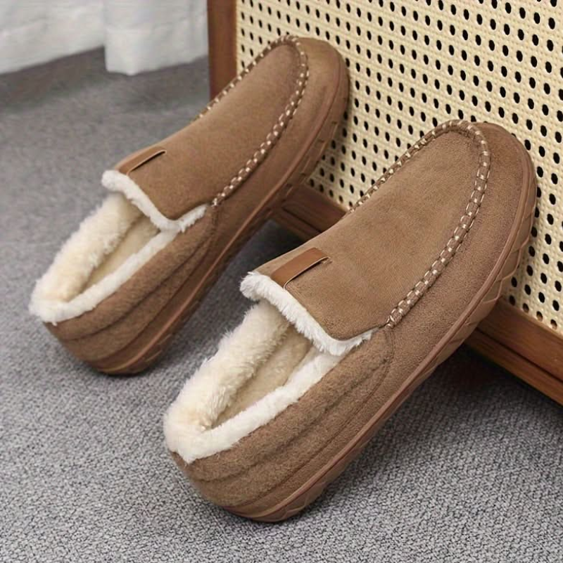 Men's slip-on moc toe slippers with plush lining and flat textured soles