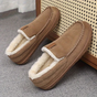Men's slip-on moc toe slippers with plush lining and flat textured soles