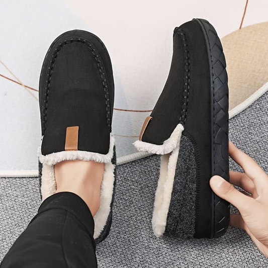 Men's slip-on moc toe slippers with plush lining and flat textured soles
