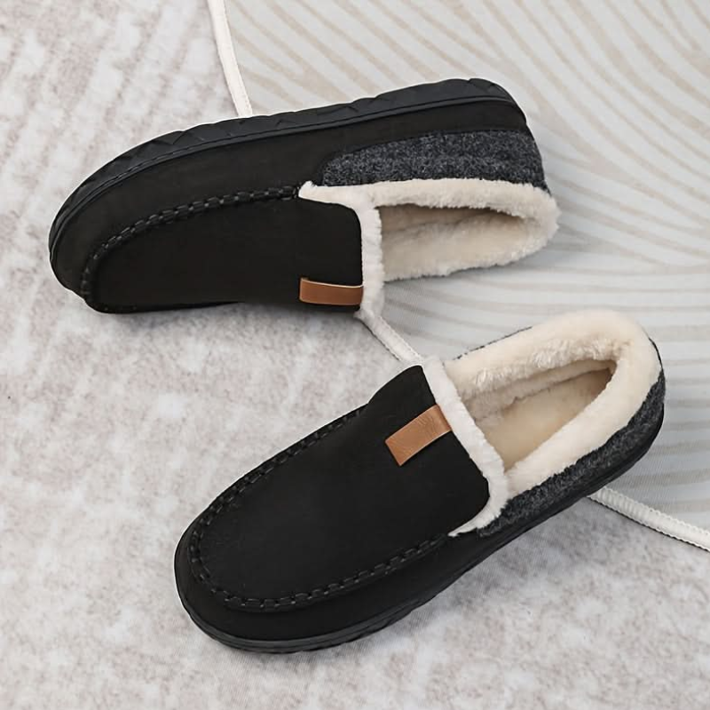 Men's slip-on moc toe slippers with plush lining and flat textured soles