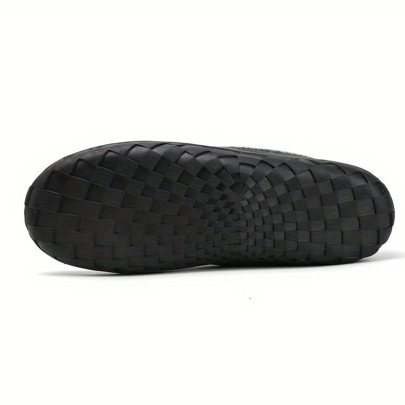 Men's slip-on moc toe slippers with plush lining and flat textured soles