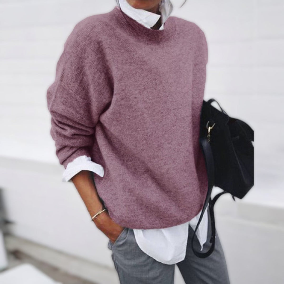 Women's crew neck knit sweater with long sleeves and ribbed trims