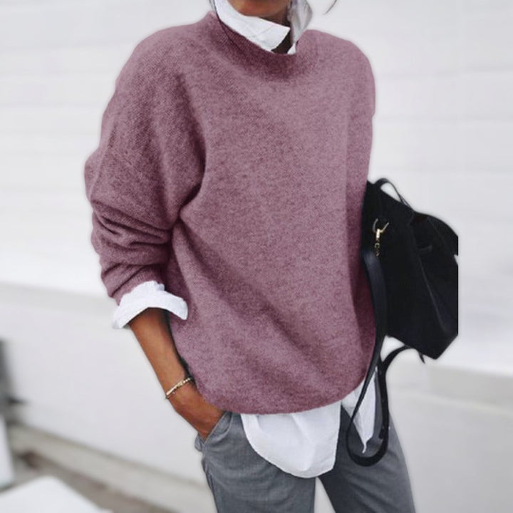 Women's crew neck knit sweater with long sleeves and ribbed trims