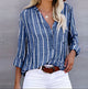 Women's striped V-neck blouse with long sleeves and button front