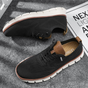 Men's textured lace-up sneakers with round toes and flat segmented soles
