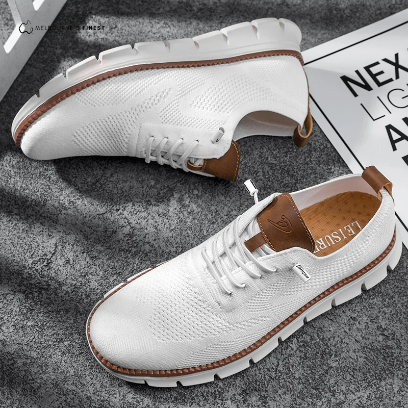 Men's textured lace-up sneakers with round toes and flat segmented soles