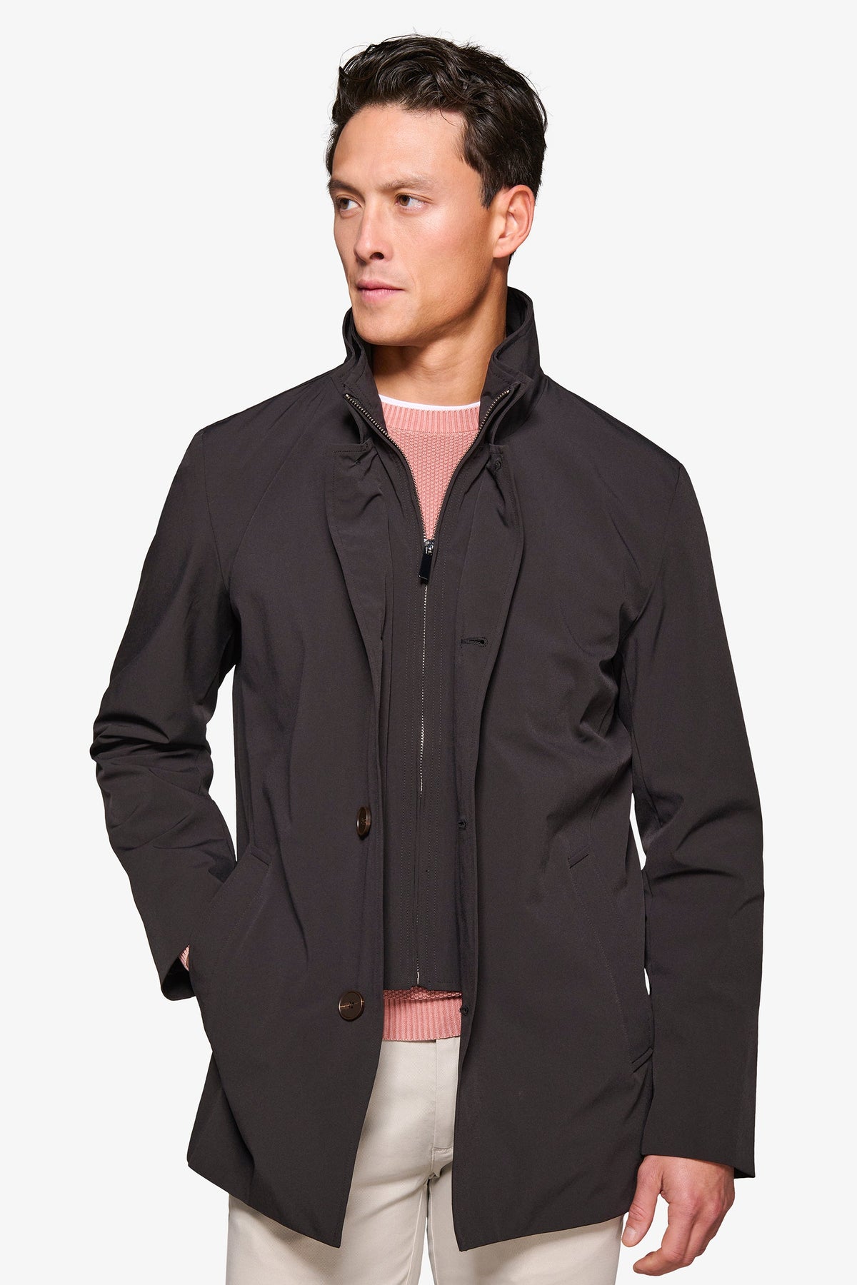 Men's black stand collar jacket with zip front and button details