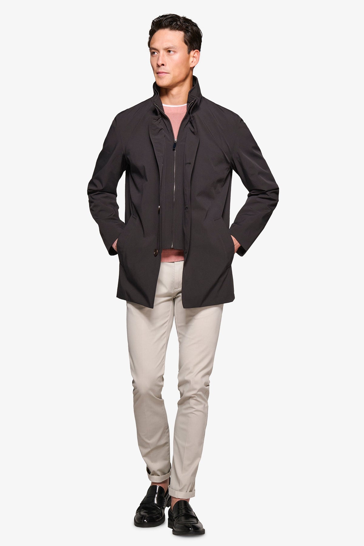 Men's black stand collar jacket with zip front and button details