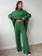 Women's long-sleeve turtleneck knit set with relaxed sweater and wide-leg trousers