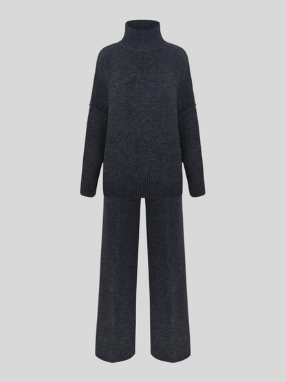 Women's long-sleeve turtleneck knit set with relaxed sweater and wide-leg trousers