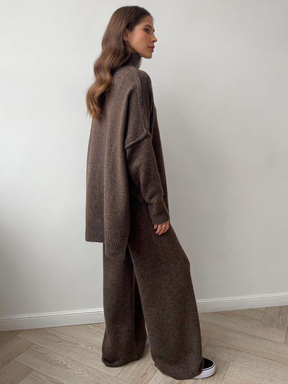 Women's long-sleeve turtleneck knit set with relaxed sweater and wide-leg trousers