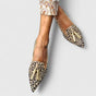 Women's pointed leopard loafers with tassel trim