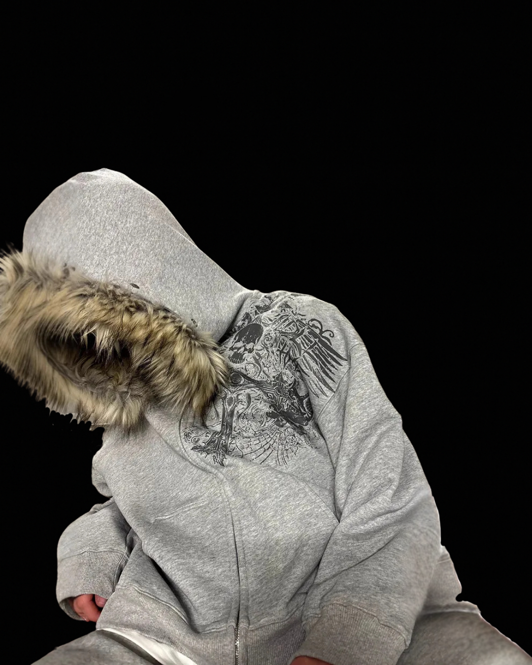 Hooded zip hoodie with contrasting faux fur trim and front pocket