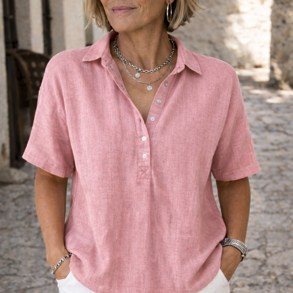 Women's short sleeve collared button blouse with polo neckline