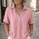Women's short sleeve collared button blouse with polo neckline