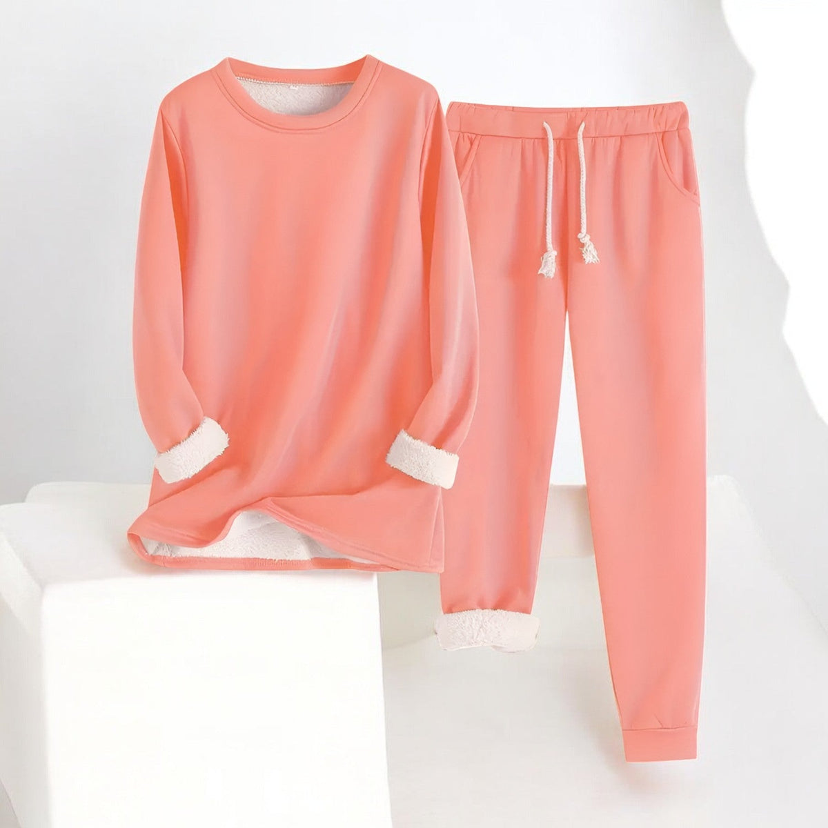 Long-sleeve crew neck sweatshirt and matching drawstring joggers with cuffed hems