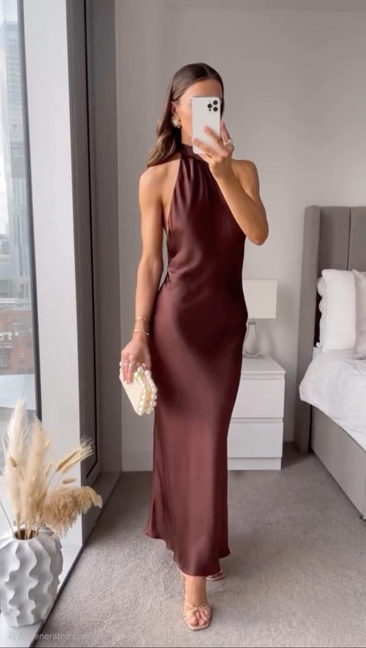 Women's brown sleeveless halter maxi dress with a floor-length skirt