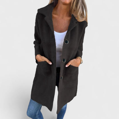 Women's longline textured coat with notched lapels, buttons and front pockets