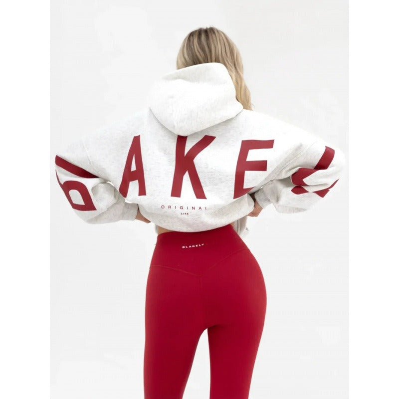 Women's hooded pullover with graphic back and sleeve print