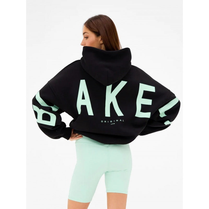 Women's hooded pullover with graphic back and sleeve print