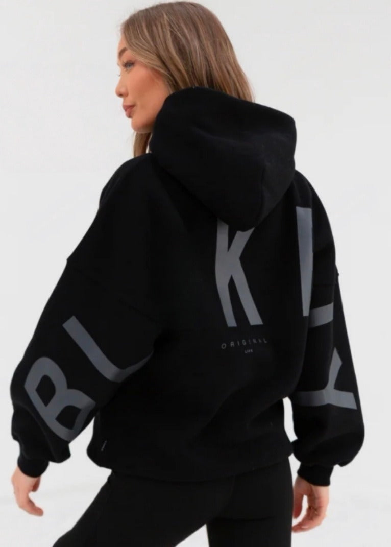 Women's hooded pullover with graphic back and sleeve print