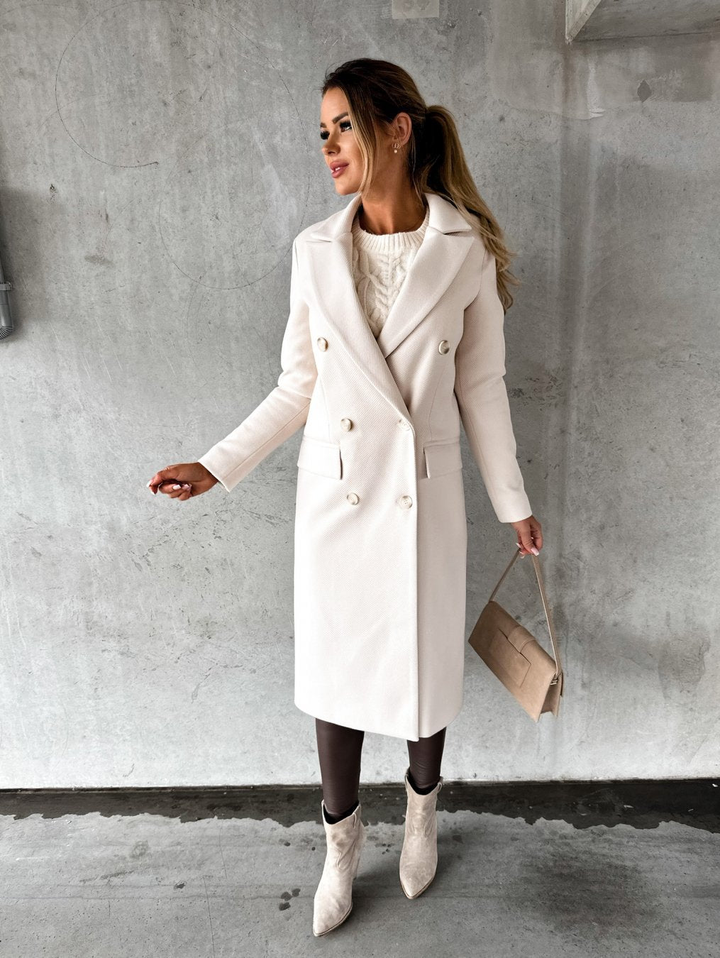Women's long double-breasted coat with notched lapels