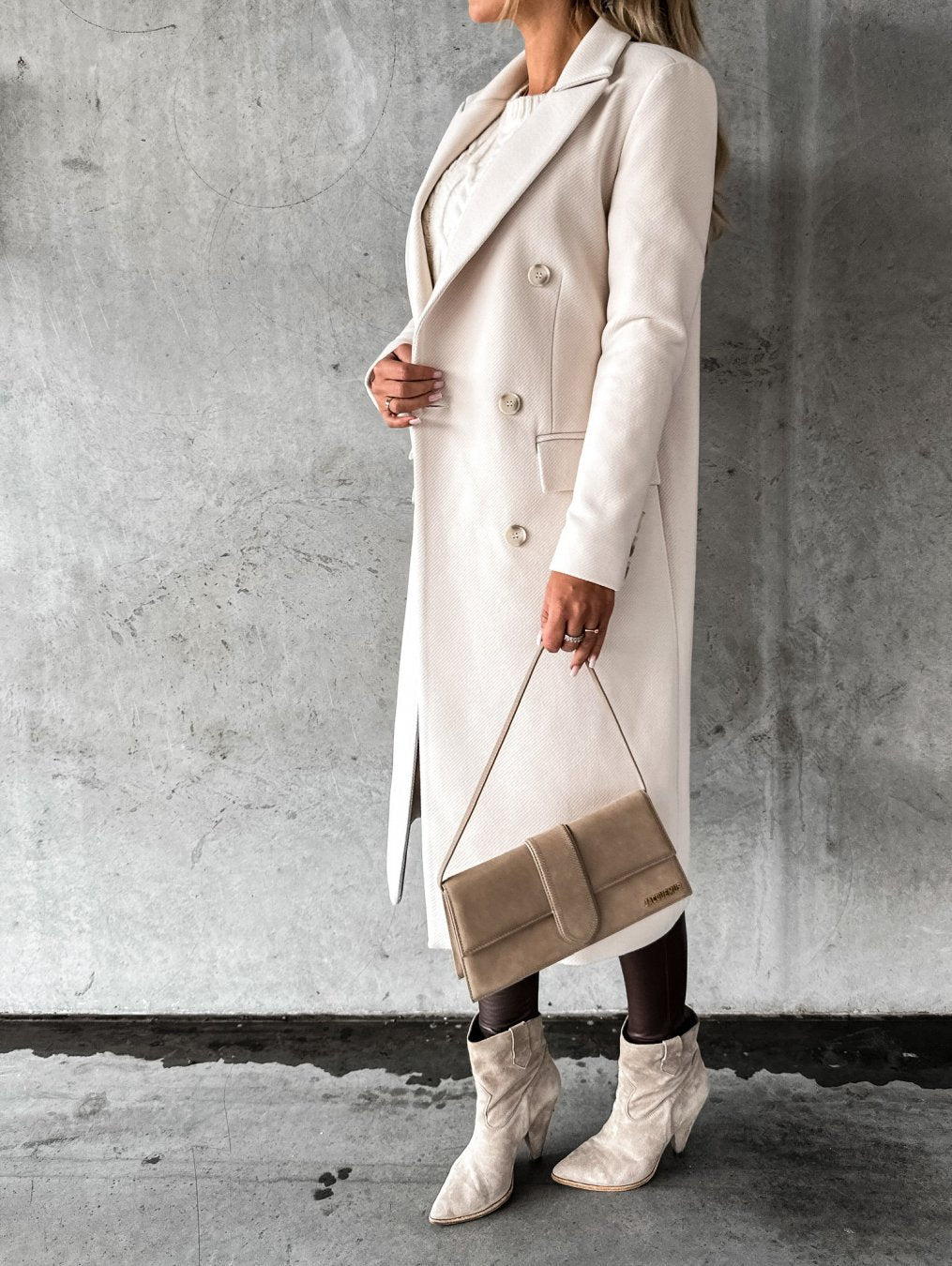 Women's long double-breasted coat with notched lapels