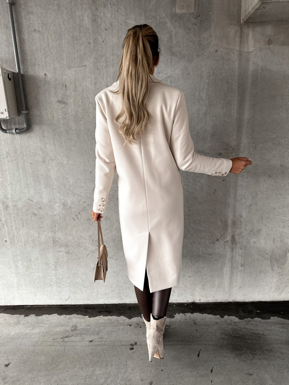 Women's long double-breasted coat with notched lapels