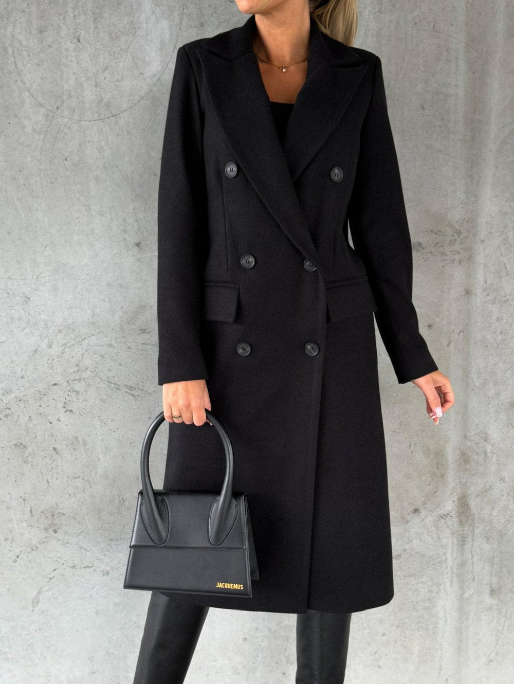Women's long double-breasted coat with notched lapels