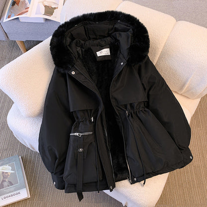 Women's hip-length parka jacket with fur-trimmed hood, drawstring waist and multiple pockets