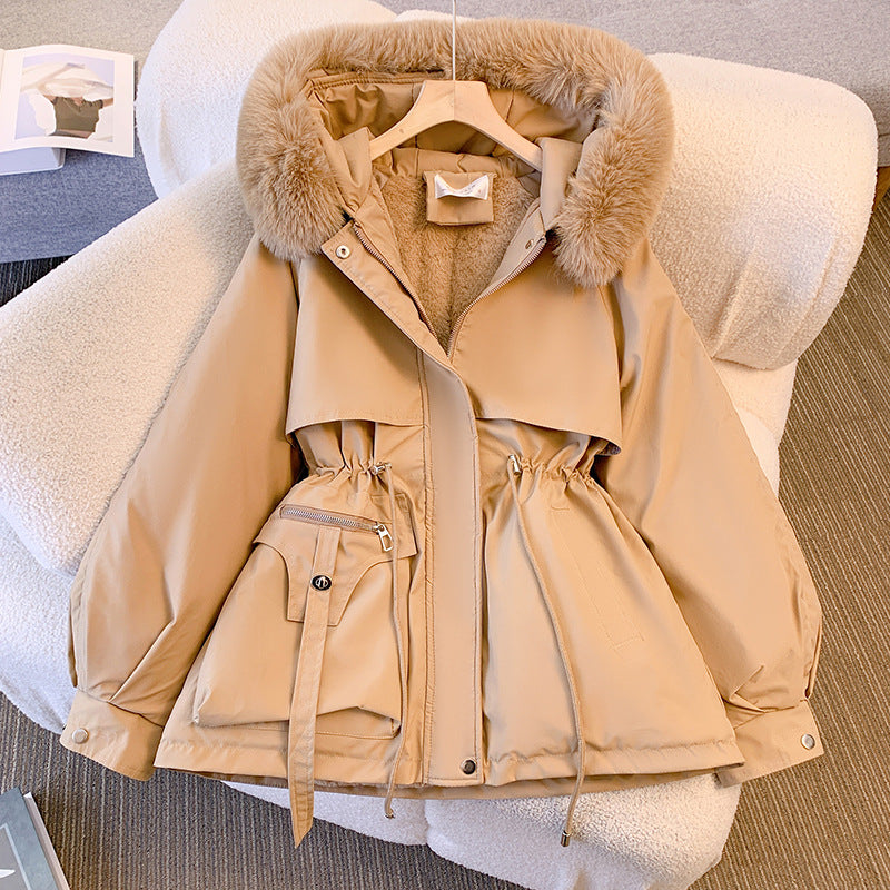 Women's hip-length parka jacket with fur-trimmed hood, drawstring waist and multiple pockets