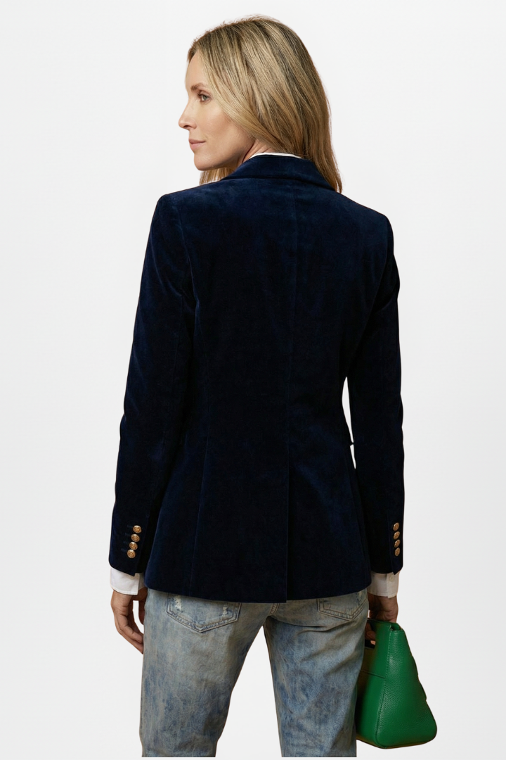 Women's tailored dark blazer with peaked lapels, gold-tone button and flap pockets