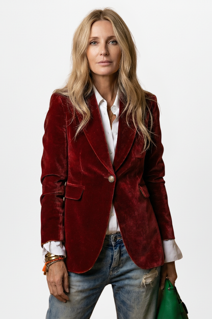 Women's tailored dark blazer with peaked lapels, gold-tone button and flap pockets