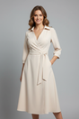 Women's collared wrap midi dress with three-quarter sleeves and tie waist