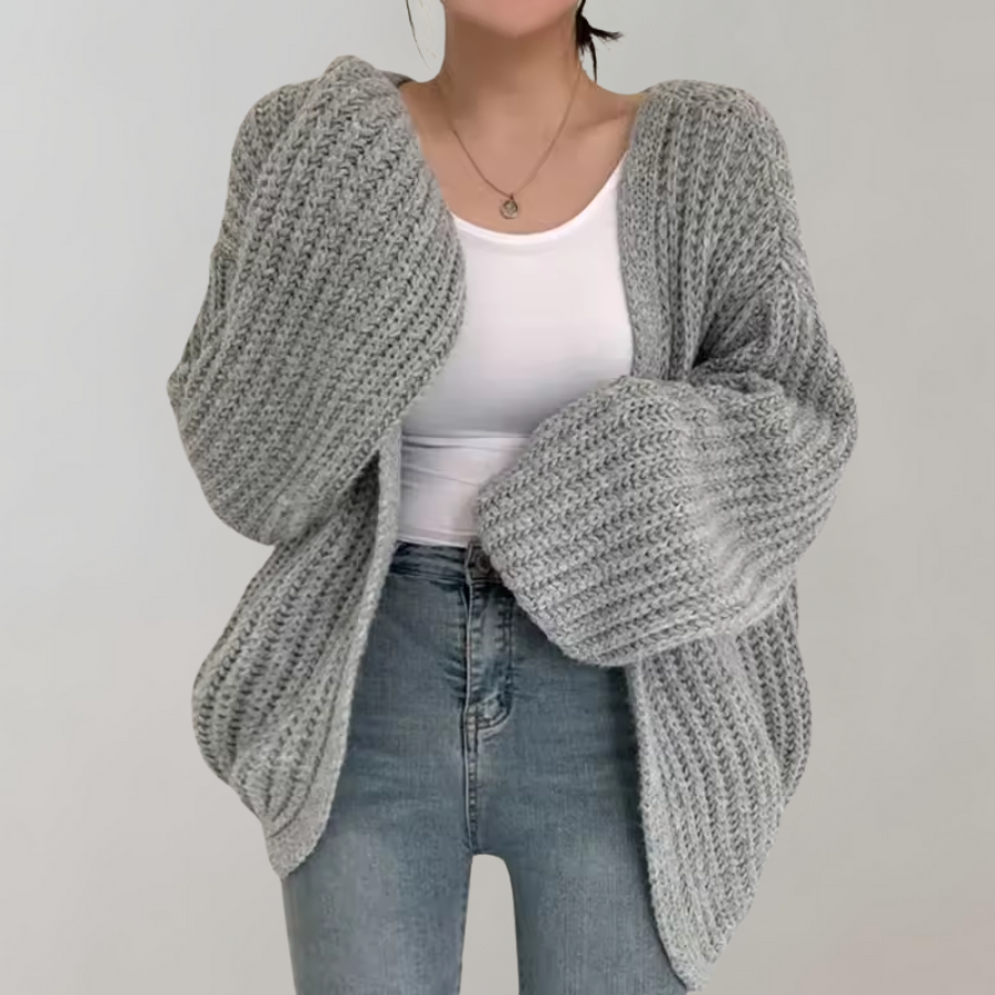 Women's chunky knit cardigan with an open front and oversized long sleeves