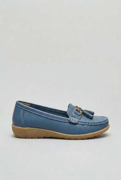 Women's slip-on tassel loafer with metal bit detail and low wedge sole
