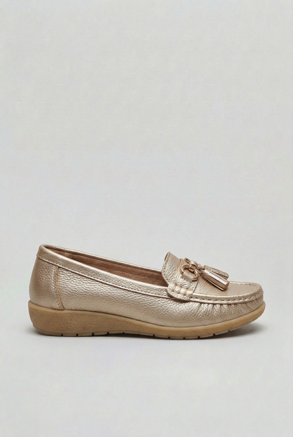 Women's slip-on tassel loafer with metal bit detail and low wedge sole