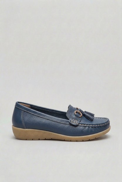 Women's slip-on tassel loafer with metal bit detail and low wedge sole